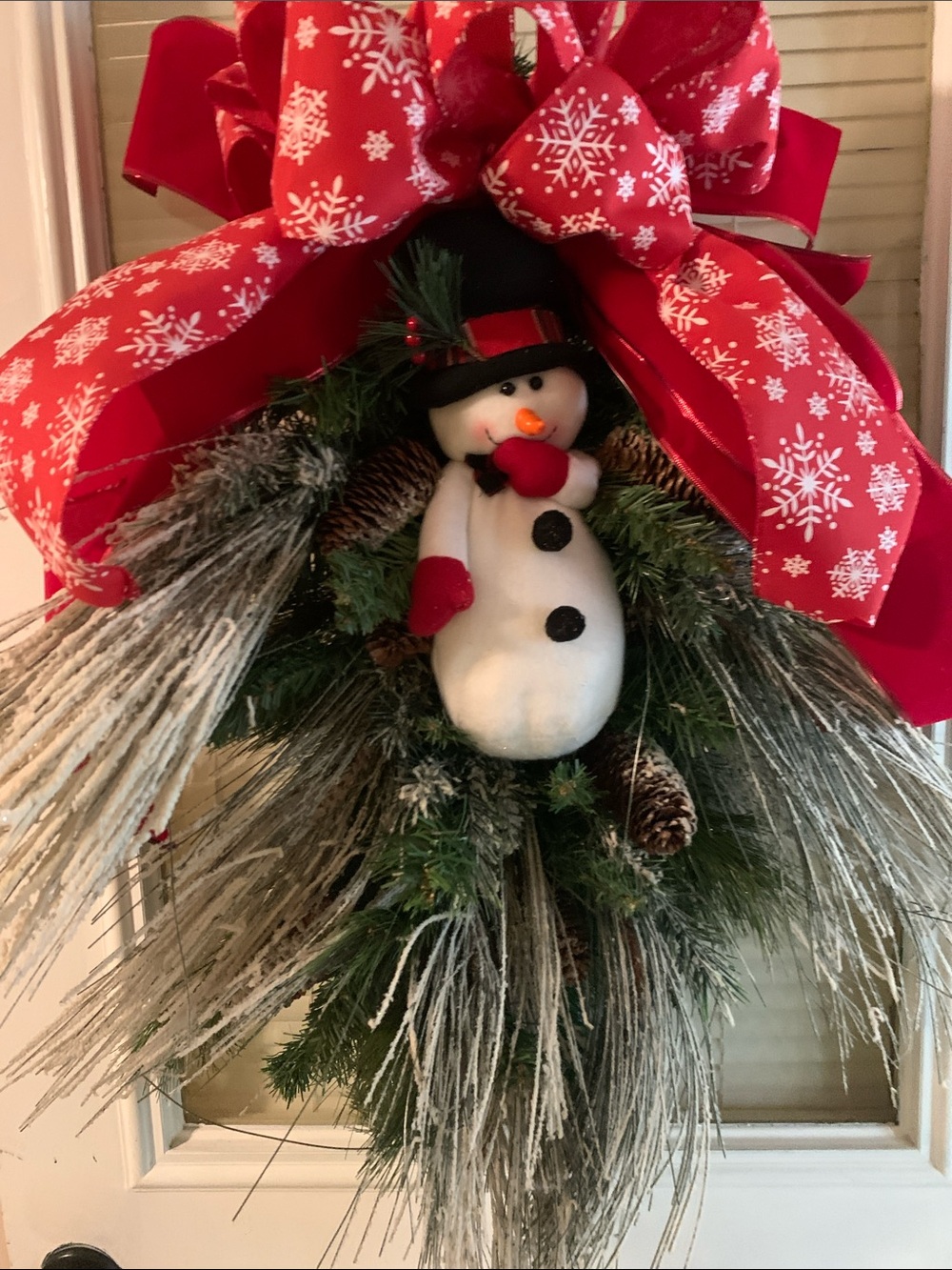 D,s designs. Red Snowflake Ribbon Holiday Wreath with Plush Snowman Accent